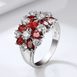 BAGUE FLEUR EN ARGENT AVEC CLUSTER DE GRENAT ROUGE