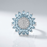 BAGUE FLEUR EN TOPAZE BLEU ARGENTÉ