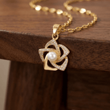 COLLIER RAYONNANT EN OR PERLE