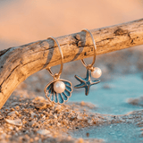 BOUCLES D'OREILLES EN COQUILLAGE ET ÉTOILE