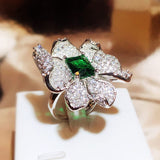 BAGUE FLEUR ÉMERAUDE - (AJUSTABLE)