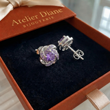 Boucles d'oreilles en cristal violet en forme de nœud | Or blanc