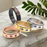 Bague Antistress Rotative – Acier Inoxydable avec Pattes Arc-en-Ciel