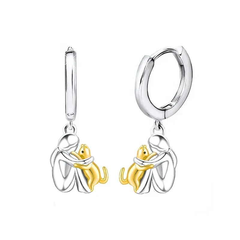 Boucles d'oreilles en forme d'étreinte de chat en argent et or bicolore