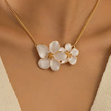 COLLIER DE FLEURS EN PERLES D'OR