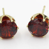 Boucles d'oreilles rondes en rubis